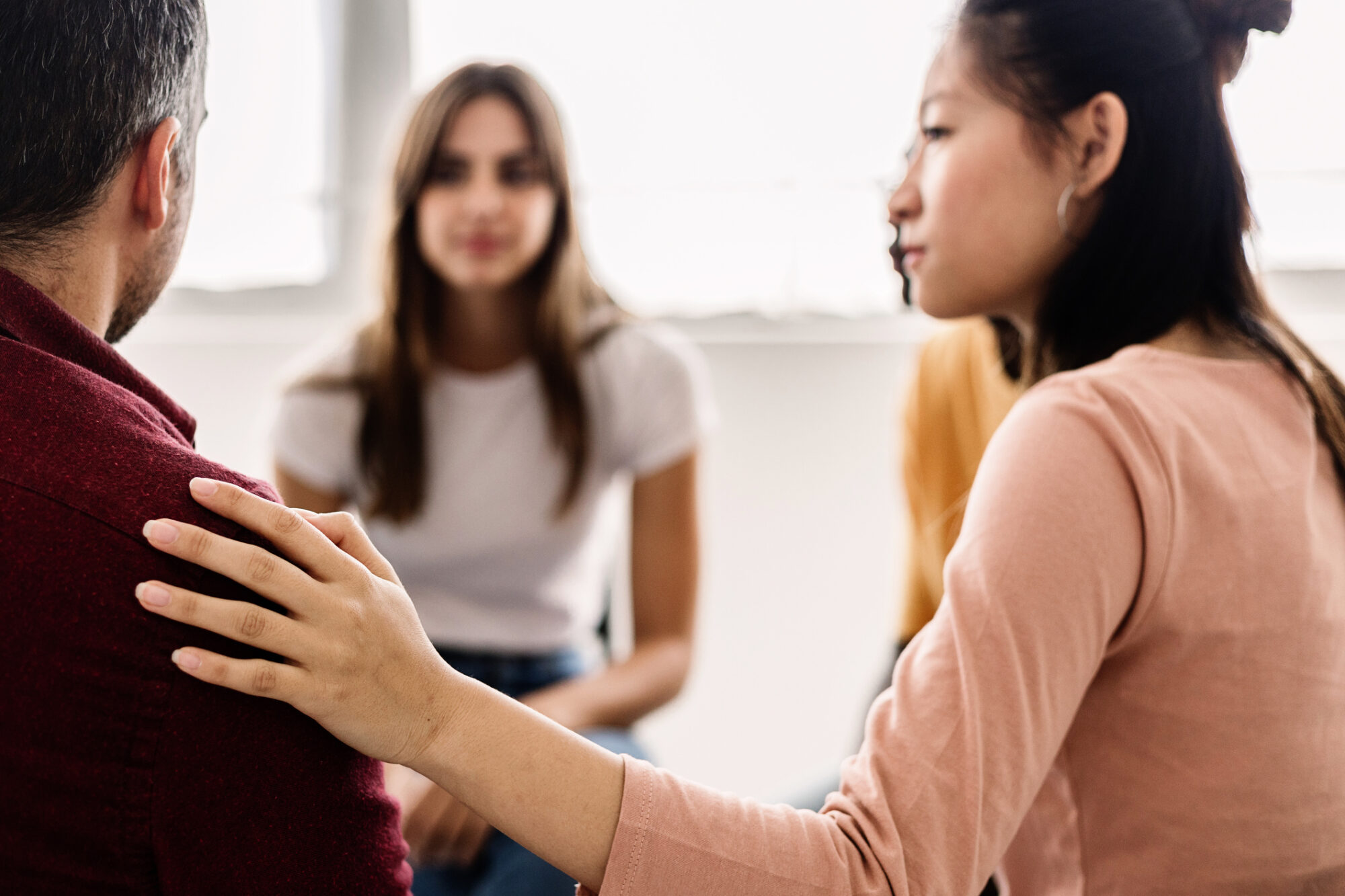caregiver support group session facilitated by health professional